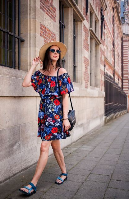 With hat, black bag and blue sandals