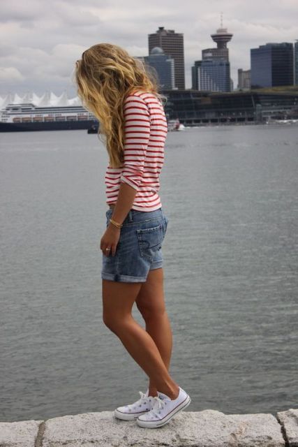 With red and white striped shirt and white sneakers