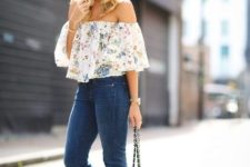 With skinny jeans, chain strap bag and flat sandals