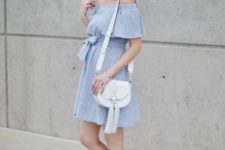 With straw hat, white bag and white lace up flats