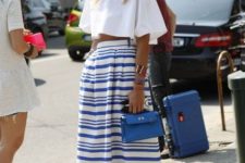 With striped maxi skirt, flat sandals and blue bag
