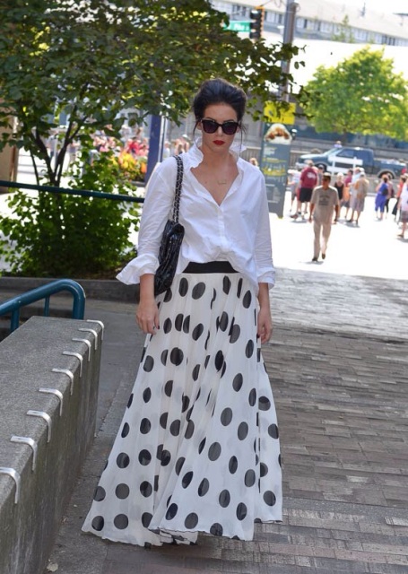 Combining a polka dot top with a white skirt