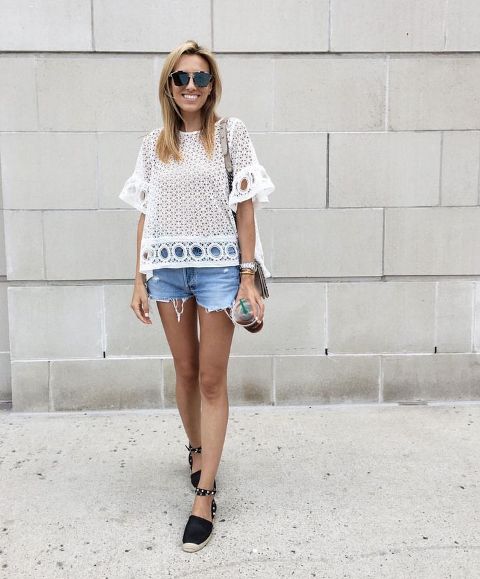 With white lace blouse and denim shorts