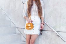 With white lace blouse, mini skirt and yellow small bag