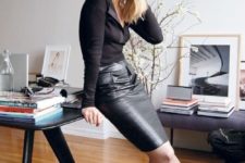 02 a black leather pencil skirt, a black top and shoes for a monochromatic look