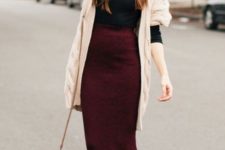 05 a black turtleneck, a burgundy pencil midi, matching booties and a cardigan