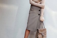 06 a blush sweater, a printed skirt with buttons, nude shoes and a blush bag