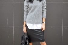 07 a white shirt, a grey sweater, a black leather skirt, black combat boots and a black bag for a casual look