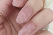 09 nude marble nails with an almond shape is a hot and trendy choice