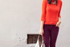 12 an orange turtleneck, plum-colored pants, orange shoes and a neutral bag