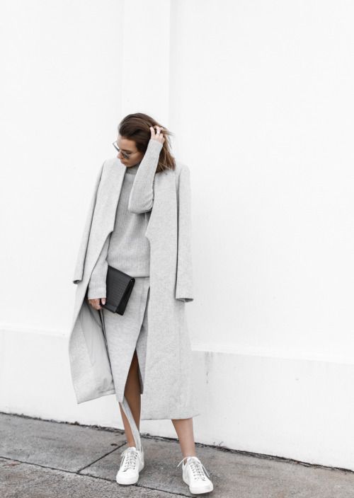 a grey top and wrap skirt, a grey coat and white sneakers for a chic minimal look