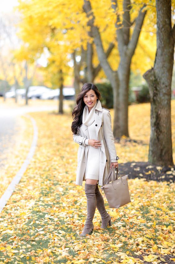 an off-white dress, an off-white trench, a neutral bag and tall suede brown boots