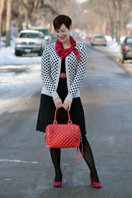 With black dress, plaid scarf, red bag and red pumps