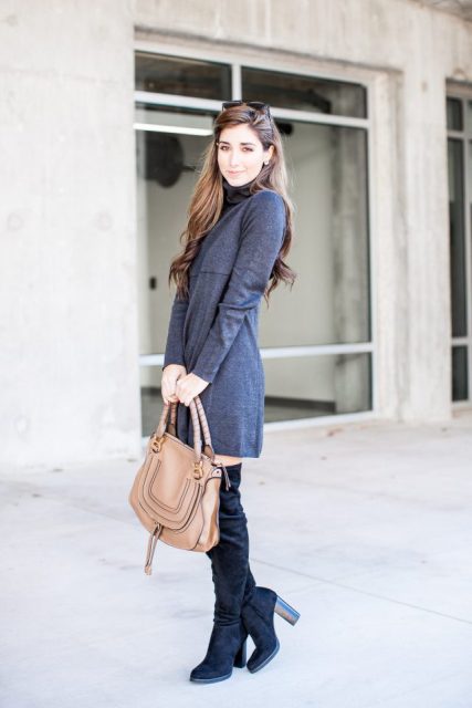 With black over the knee boots and brown bag