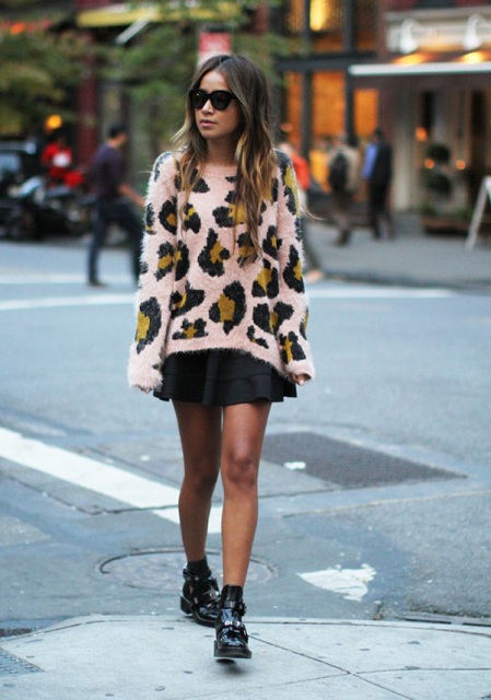 With black skater skirt and ankle boots