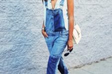 With denim jumpsuit, red shoes and white bag