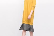 With gray pleated skirt and platform shoes