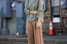With loose sweater and culottes