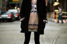 With mini skirt, gray shoes and black coat