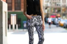 With printed skinny pants and black ankle boots