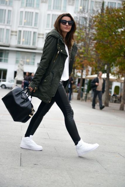 With white shirt, white sneakers, black tote and leather pants