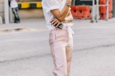 With white t-shirt, pale pink trousers and tote