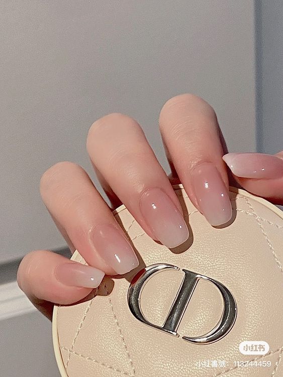 a classy ombre French manicure looks much more delicate and subtle than a usual one and is pretty for any season and outfit