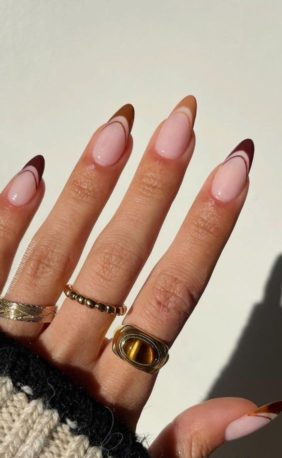 long almond nails with brown, hazel and caramel tips as a fresh fall-inspired alternative to French nails