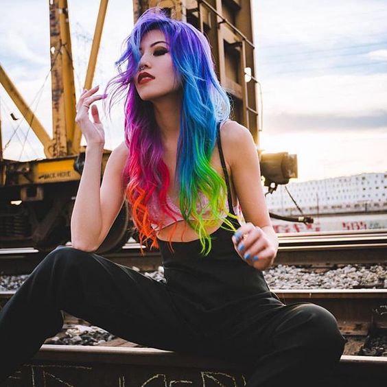 bold and colorful long rainbow hair is a wow statement for any girl