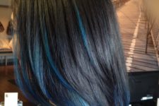 06 a black layered long bob with blue highlights and ends for a touch of rock