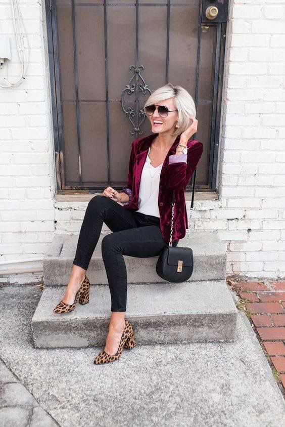 black skinnies, a white top, leopard shoes and a plum-colored velvet blazer
