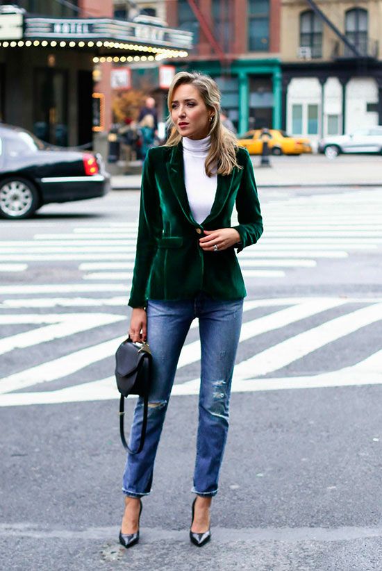blue girlfriend jeans, a white turtleneck, an emerald velvet blazer, black shoes and a bag