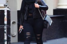 13 a total black look with ripped denim, a tee, a scarf, boots and a leather jacket for a rock touch