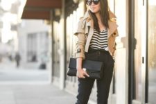 13 black pants, nude shoes, a striped tee, a cropped tan trench and a black clutch