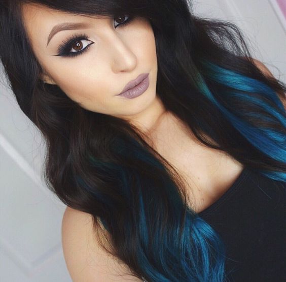 long wavy black hair with turquoise balayage is a statement idea for any girl