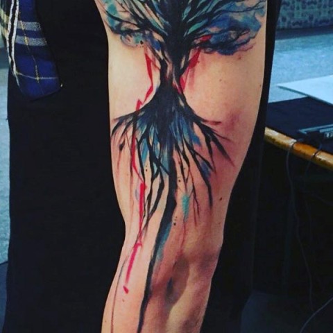 Artistic tattoo on the leg