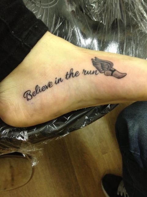 Believe in the run tattoo with a wing on the foot