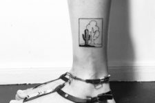 Black and white tattoo on the ankle