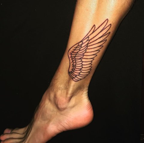 Black-contour wing tattoo