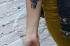 Black tattoo idea on the forearm