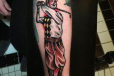 Colorful retro styled tattoo on the forearm