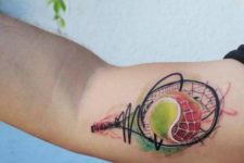 Colorful tattoo on the biceps