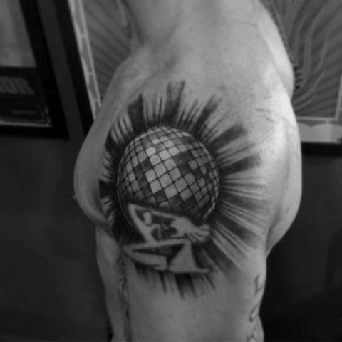 Disco ball and dancing people tattoo on the shoulder