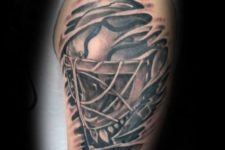 Hockey mask tattoo