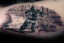 Hockey player tattoo on the hand