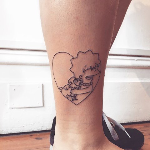 Lisa and lamb tattoo on the leg