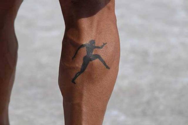 Simple black tattoo on the leg