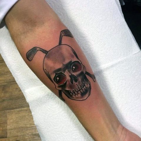 Skull and golf clubs tattoo