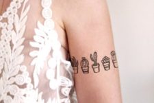 Tiny cactus tattoos on the arm