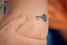 Tiny tennis tattoo